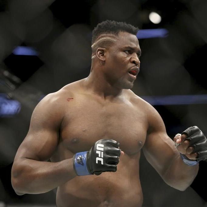 Heavyweight boxing champ Fury survives scare from former UFC fighter Ngannou to win split decision